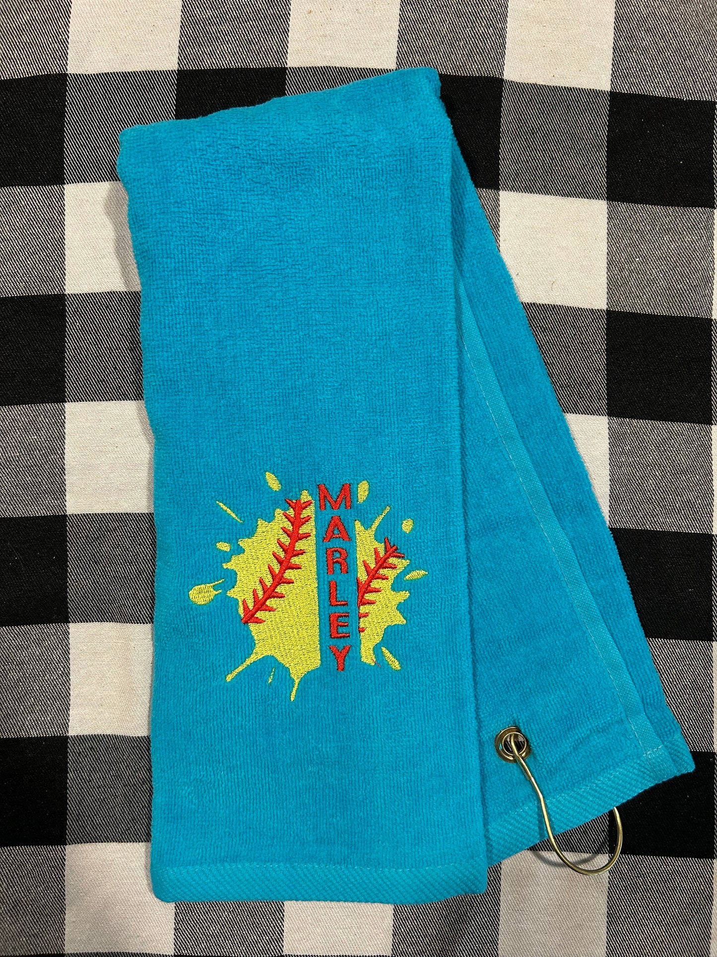 Softball towel with grommet
