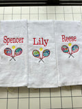 Tennis towel with grommet