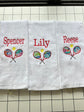 Tennis towel with grommet